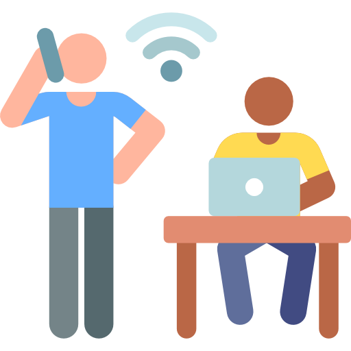 Person on phone with wireless signal and another person working on a laptop at a desk, illustrating efficient communication and support for managing high call volumes in businesses.
